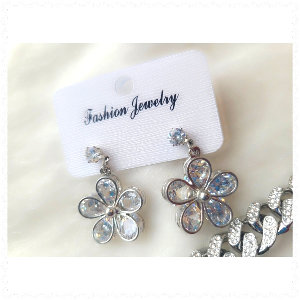 New Silver tone Earrings with cubic zirconia